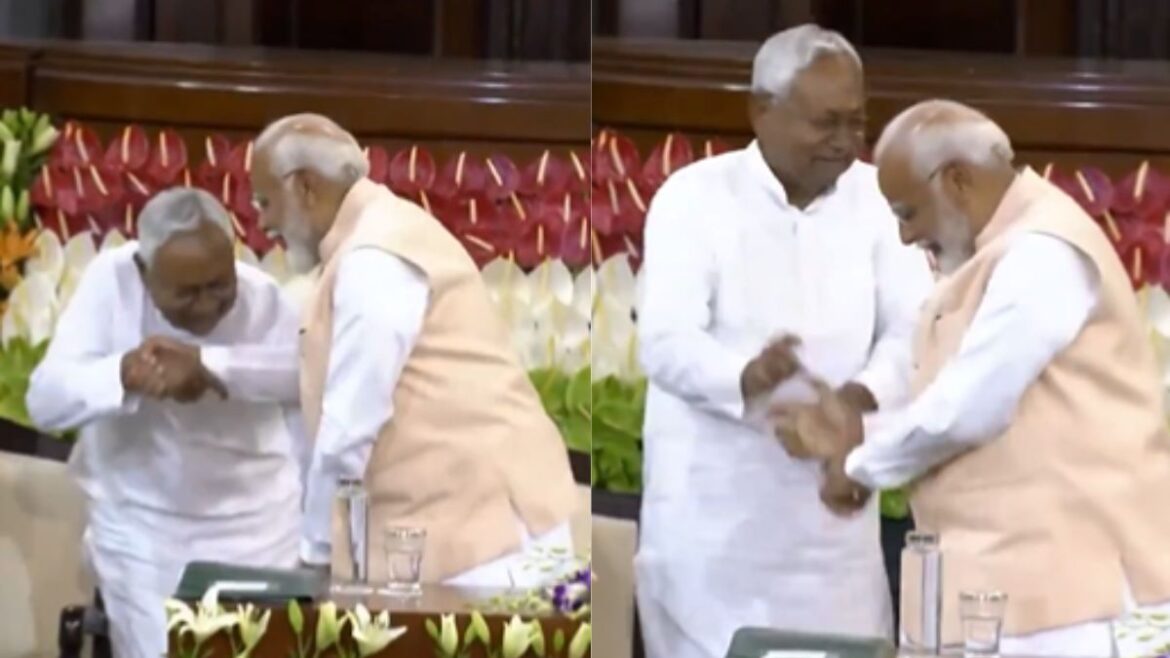 nitish kumar touched pm modi parliament feet nda viral video bjp