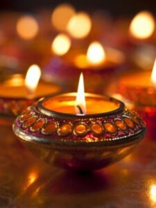 a-diya-oil-lamp-diwali-concept-blurred-hindu-festival-of-lights-celebration-background-ai-generative-photo
