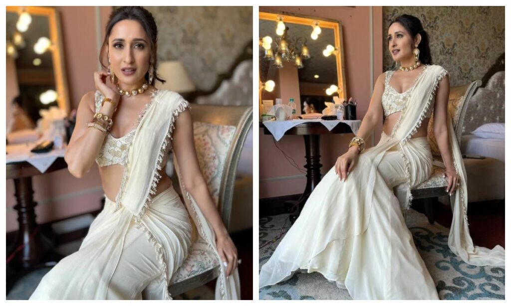 Off white saree with contrast blouse