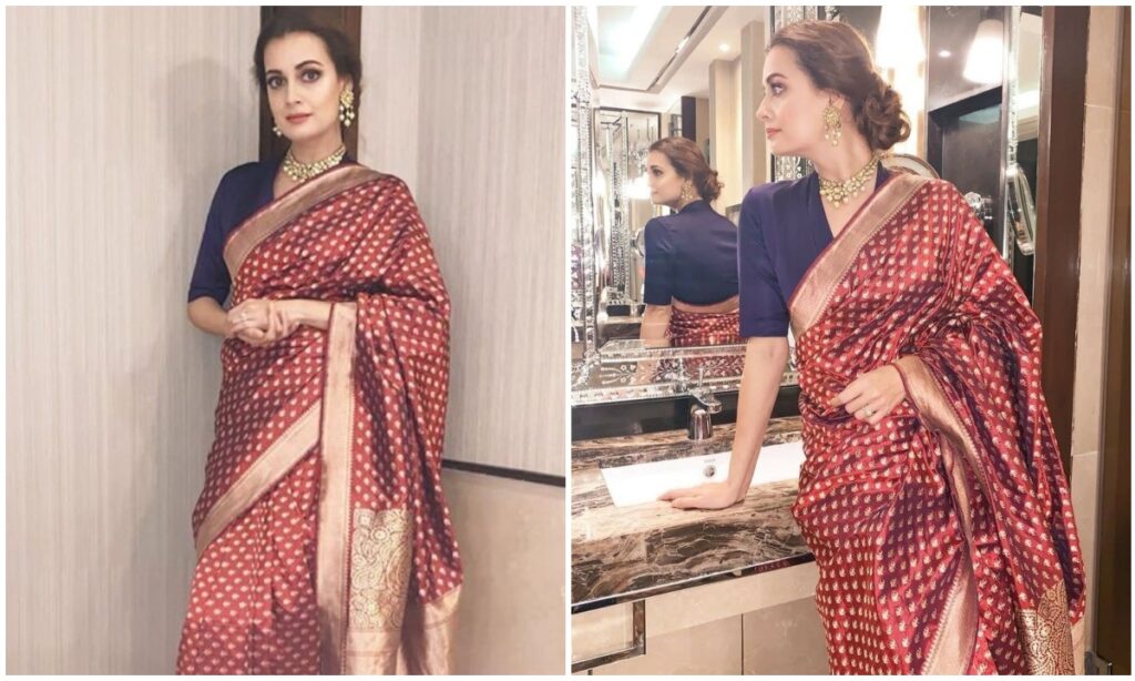 Maroon saree with blue color blouse