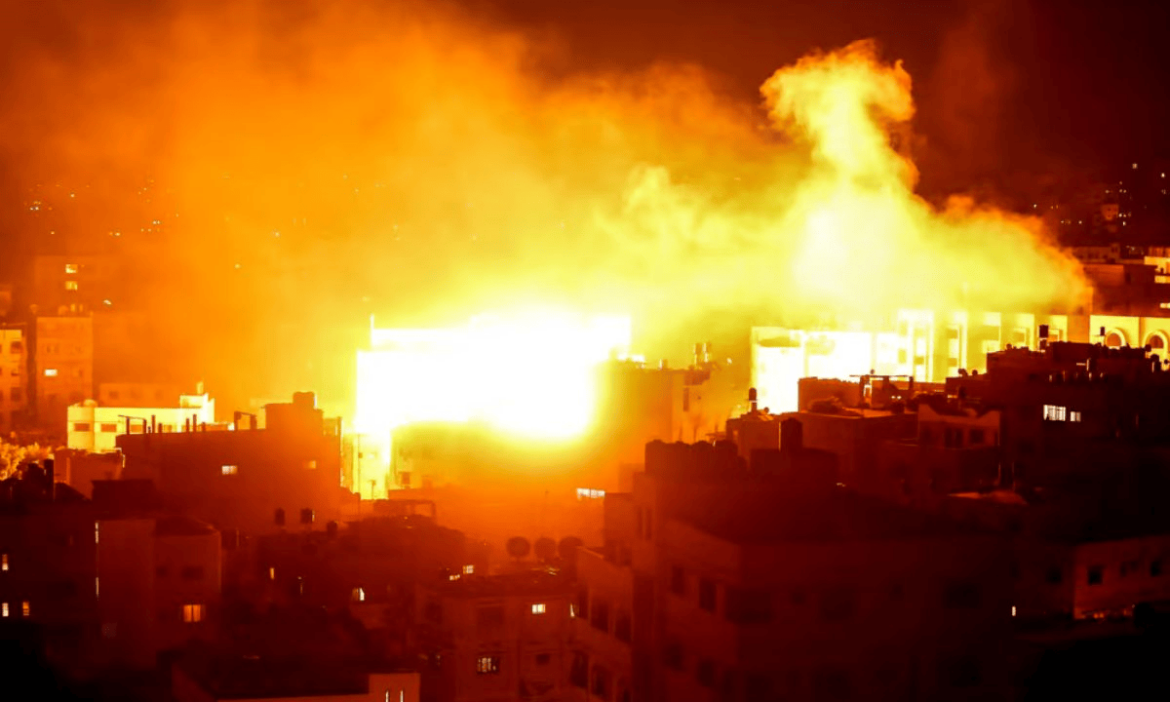 Israel defence minister Gaza burning heavy strikes Gaza City