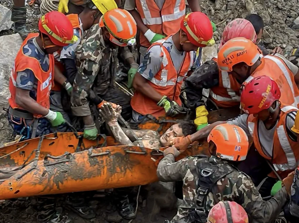 Nepal death toll floods rises 1295